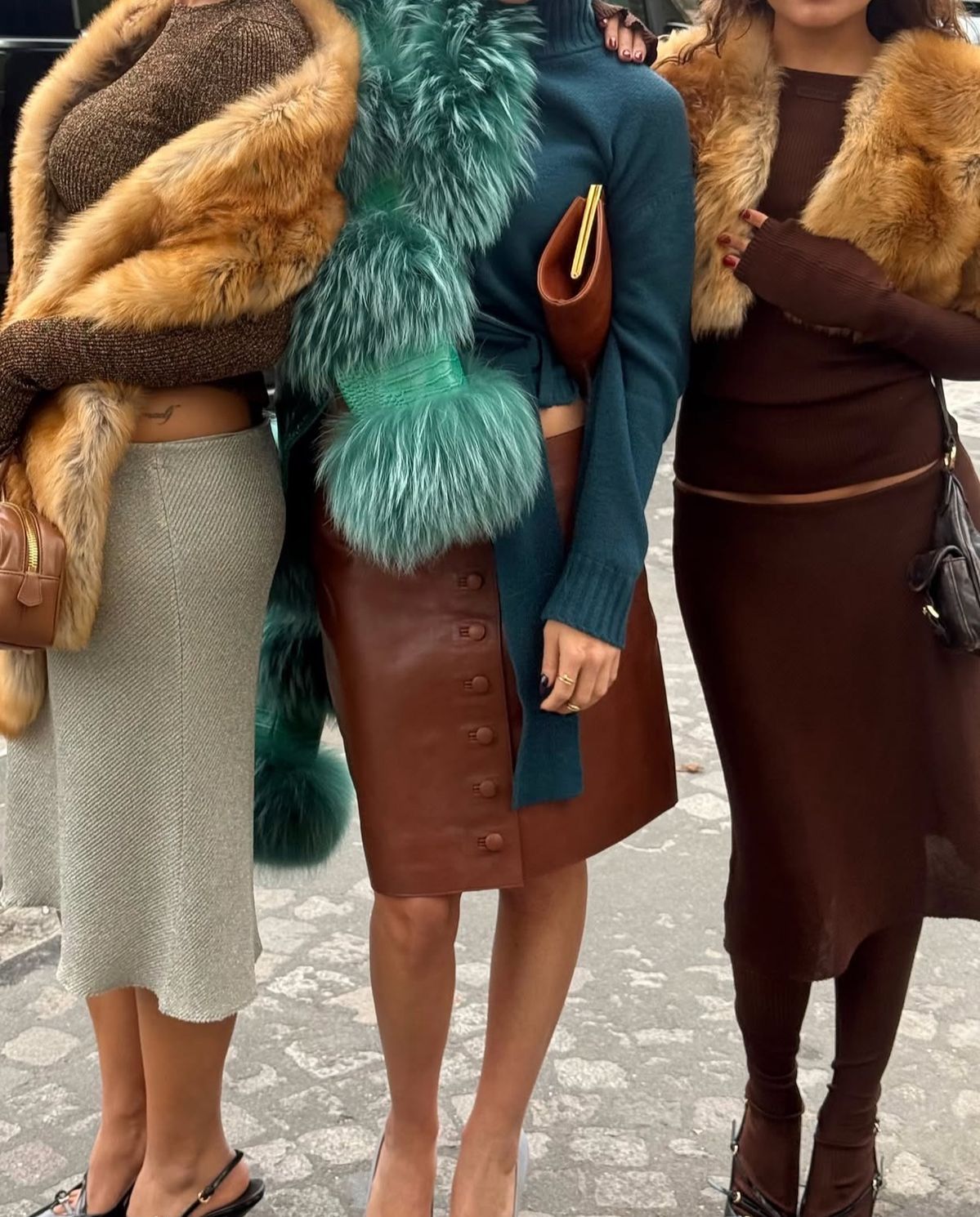 Three coordinated fashion looks in teal, brown and warm neutral tones